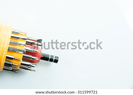 Red and Yellow screwdriver isolated on white background