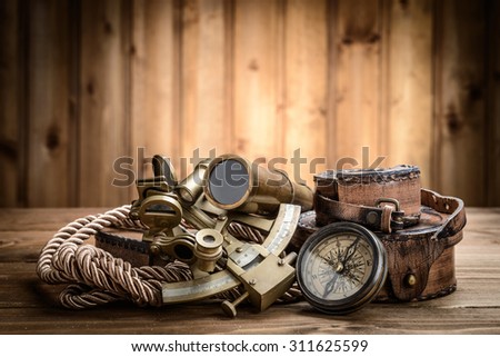 vintage still life with compass,sextant and spyglass 