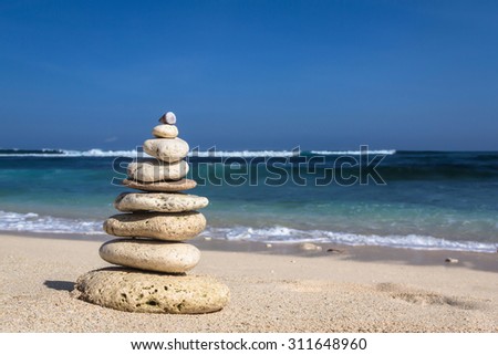Pyramid of stones on the beach