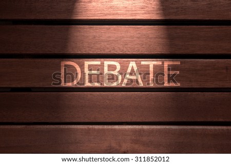 debate text on wooden