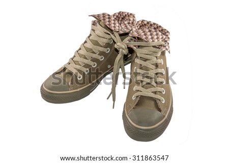 brown canvas shoes on a white background