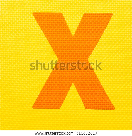 letter "X" on yellow background
