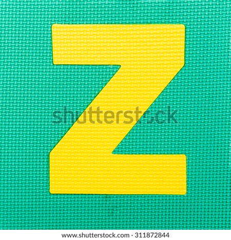 letter "Z" on green background