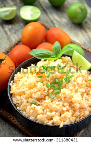 Spanish or mexican rice garnished with lime