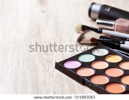 Professional makeup palette, makeup brushes, makeup products  with copyspace Royalty-Free Stock Photo #311883083
