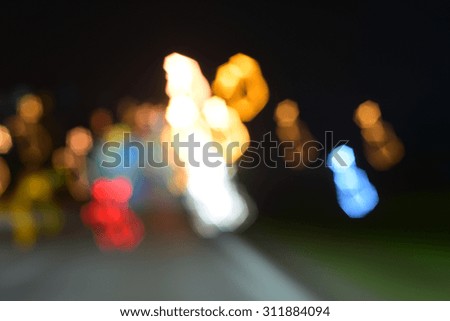 Blur image of Putrajaya highway at night with bokeh.