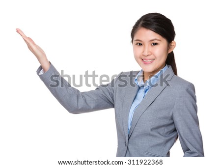 Asian young businesswoman with hand showing blank sign