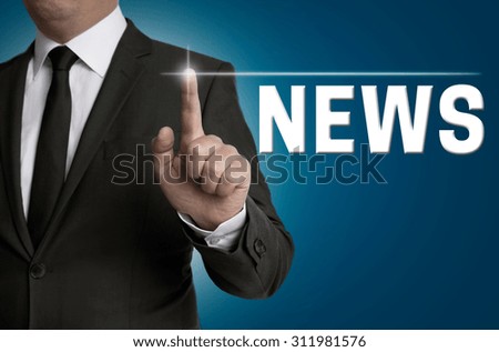 news touchscreen is operated by businessman concept.