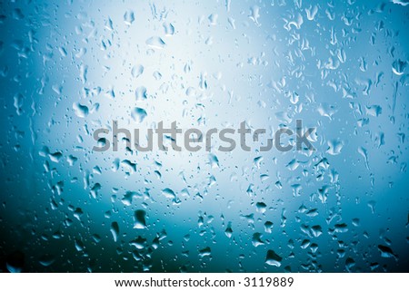 rain on the window color water rain abstract up metal close glass splash space clear metallic window wet blue liquid cool mist surface drop droplets relaxed conceptual glisten shining sparkling glossy