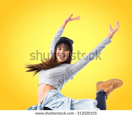 Dancer posing over colorful background
