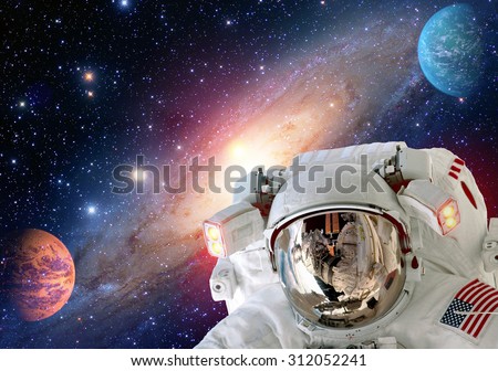 Astronaut spaceman helmet outer space solar system planet universe. Elements of this image furnished by NASA.