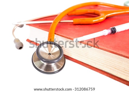 Stethoscope and textbook therapeutic