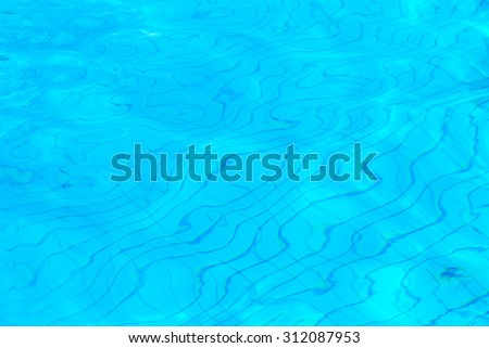 Blue ripple water in swimming pool