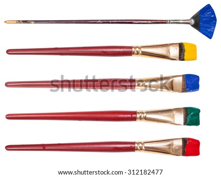 set of flat artistic paintbrushes with painted tips isolated on white background Royalty-Free Stock Photo #312182477