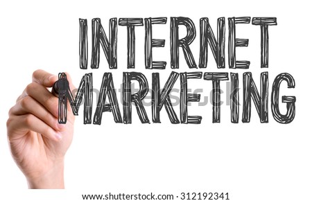 Hand with marker writing the word Internet Marketing