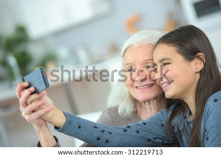 Taking a photo with grandma