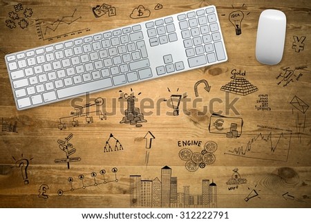view from the top of the drawings and the keyboard with a mouse on a wooden table