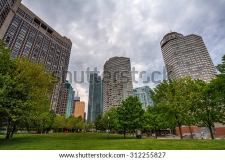 Urban park with the city skyline on the background 1