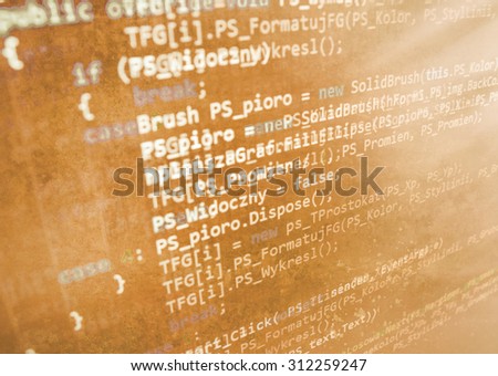 Modern technology digital computer program source code background. Vintage oldschool damaged effect. Shallow depth of field, selective focus effect. Code text written and created entirely by myself
