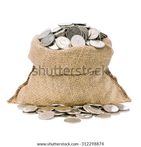 Money coins in burlap bag isolated on white background