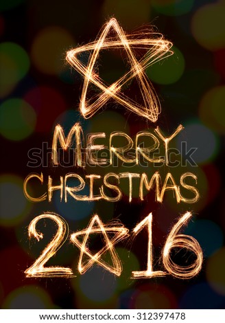 Merry Christmas 2016 word written with Sparkle firework on bokeh background