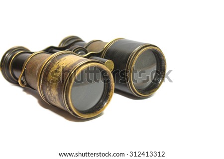 Old binoculars on white background Royalty-Free Stock Photo #312413312