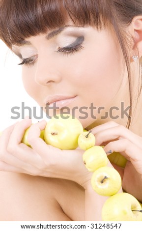 picture of beautiful woman with green apples