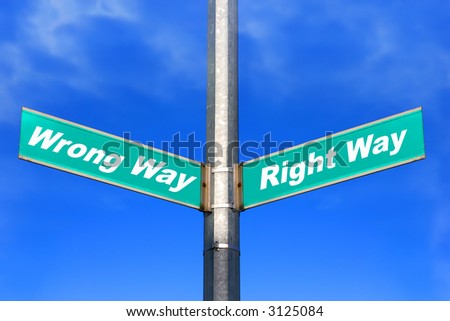 right way and wrong way -  green street sign on a blue sky
