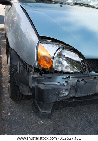 damaged cars after collision