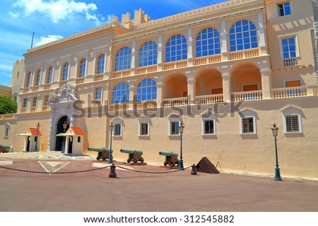 Sunny facade of the Prince's Palace sided by old canons, Monaco-ville, Monaco