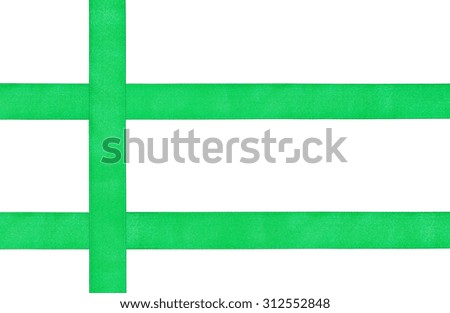 three crossing green satin strips isolated on white background