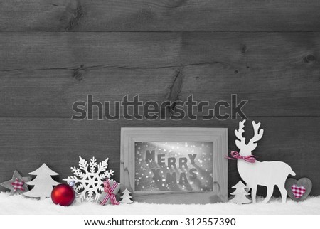 Black And White Christmas Decoration With Reindeer Christmas Trees Snowflake Red Ball On Snow. Picture Frame With English Text Merry Xmas. Christmas Card For Seasons Greetings. Wooden Background