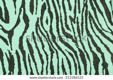 Green and black zebra pattern. Green striped animal print as background.