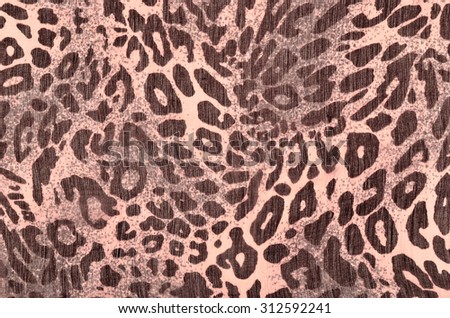 Black and pink leopard fur pattern. Spotted animal print as background.