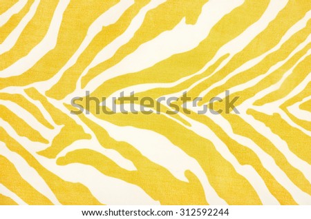 Yellow and white zebra pattern. Striped animal print as background.