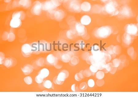 Bokeh abstract orange background.