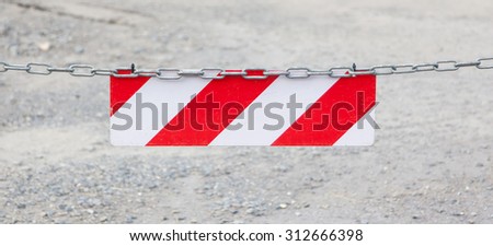 Red forbidden access sign, selective focus on sign