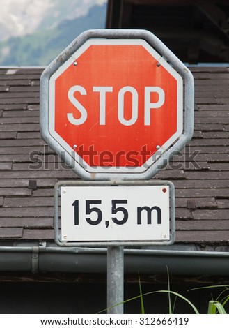 Stop sign (traffic stop sign), stop after 15,5 meters