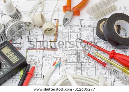 Still Life Of Electrical Components Arranged On Plans Royalty-Free Stock Photo #312685277