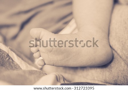 foot newborn baby care vintage