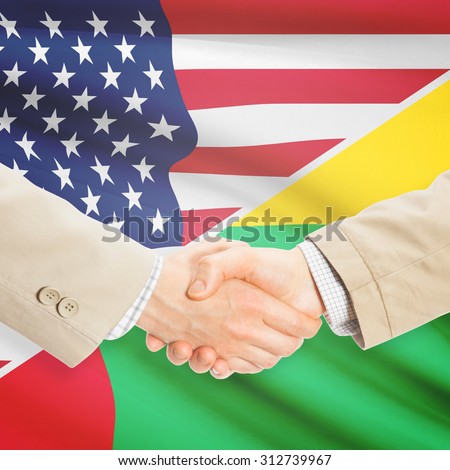Businessmen shaking hands - United States and Guinea-Bissau