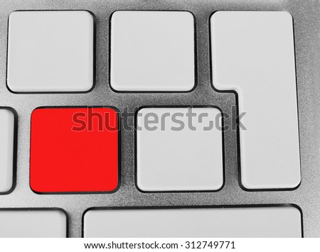 Close-up of laptop keyboard with color button