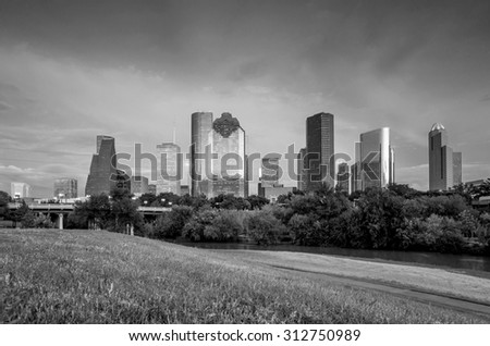 Houston, Texas  skyline at sunset twilight from park lawn