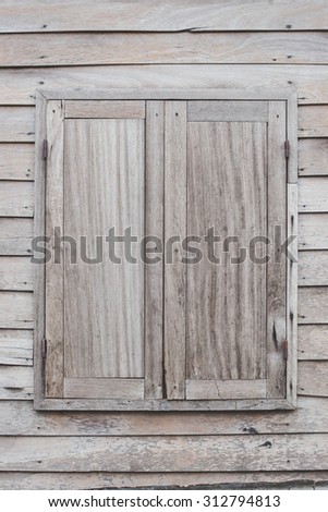 wooden window on wood wall ,old wooden wall