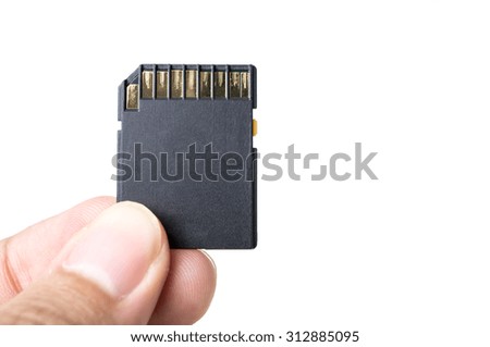 Hand with SD card isolate on white background