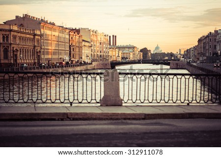 Bridge over Fontanka river at summer white nights in Saint Petersburg, Russia. Toned picture