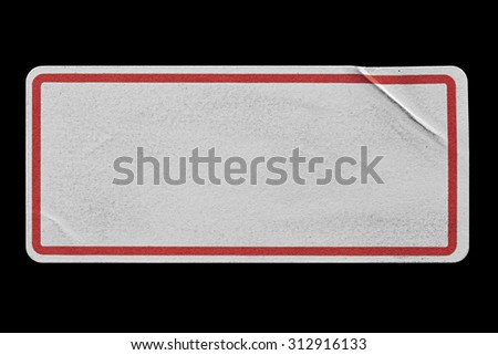 Blank White Label Adhesive with Red Border isolated on Black Background. Sticker or Paper Tag with Wrinkles and Scratches. Close Up. Top View with Copy Space for Text or Image