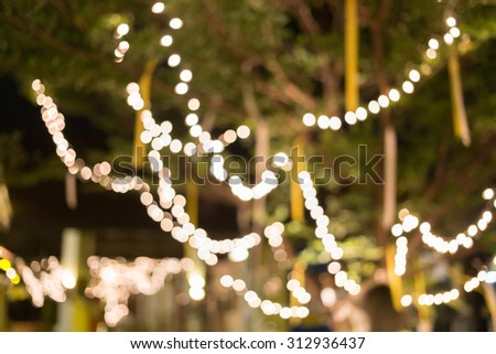 decoration light christmas celebration hanging on tree, abstract image blurred defocused background