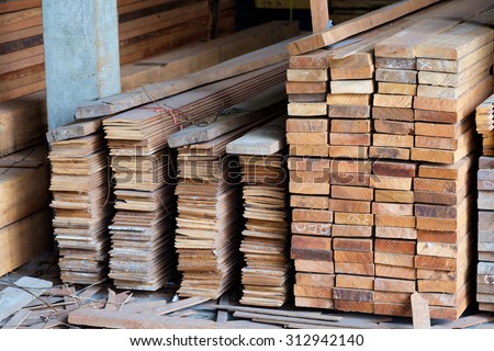 stock of timber wood construction in warehouse