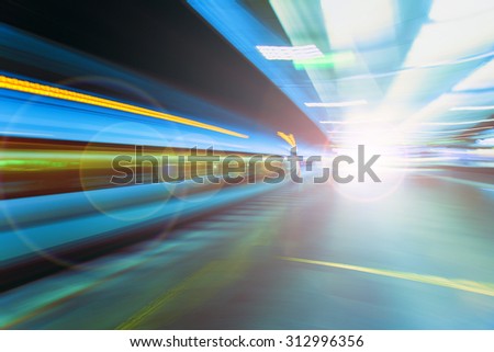 fast train traveling at high speed through a station,light speed spectrum